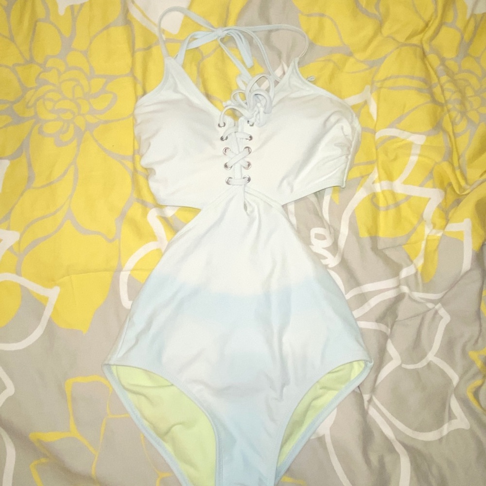 one piece suit with side cutouts